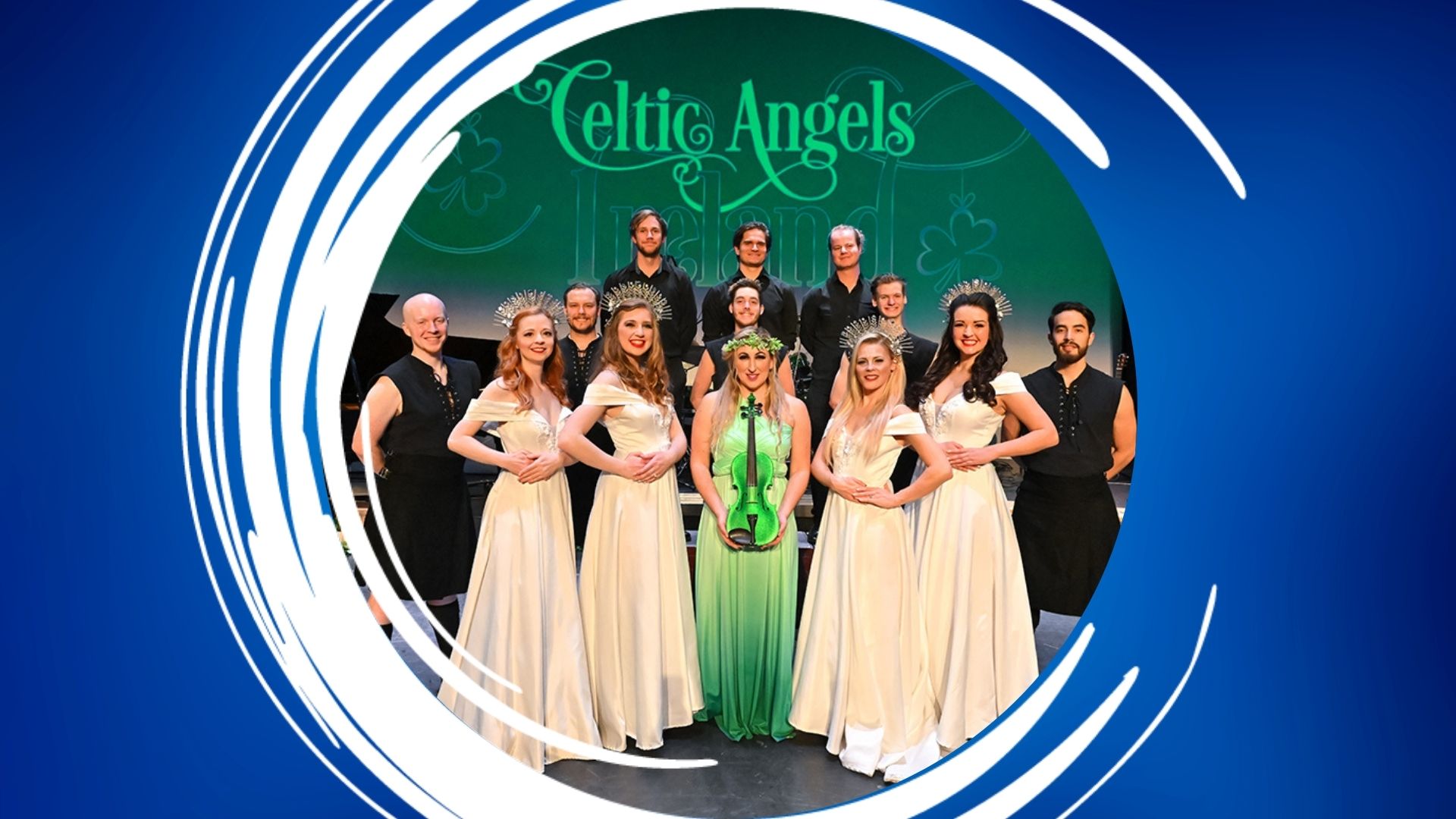 Celtic Angels Ireland – 1920×1080 Feature A group of performers on stage, fronted by women in white gowns, one holding a violin, against a backdrop reading "Celtic Angels Ireland."