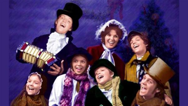 A joyful group in festive, vintage clothing, with one holding an accordion, against a purple background.