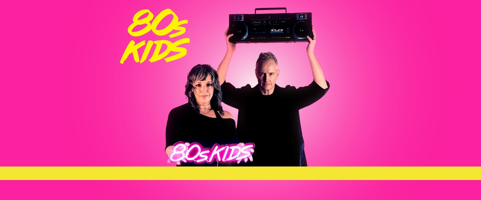 Two individuals against a pink background; a woman in a black top holds a neon pink sign reading "80s KIDS," while a man raises a boombox above his head. The bottom features a yellow stripe.