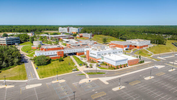 An arial view of the Grunin Center for the Arts and the surrounding parking lots and buildings