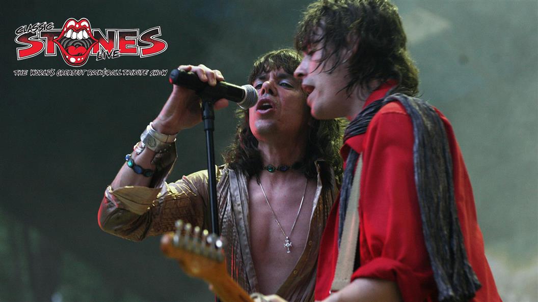 Two rock performers sing and play guitar onstage beneath a “Classic Stones Live” logo.